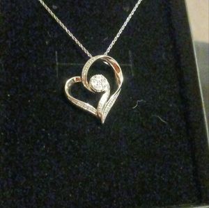 Diamond heart-shaped pendant (silver in color)